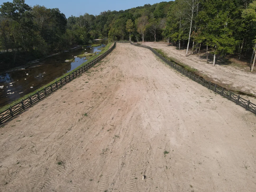 Cleared corridor along a creek after brush was ground in place